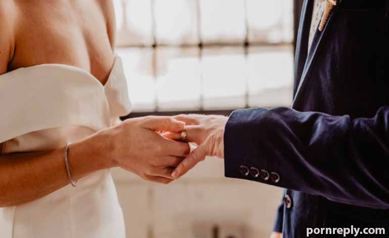 Adult Sex: How Mutual Respect Can Support Healthy Relationships Bride and groom exchange rings during a wedding ceremony, hands joined.